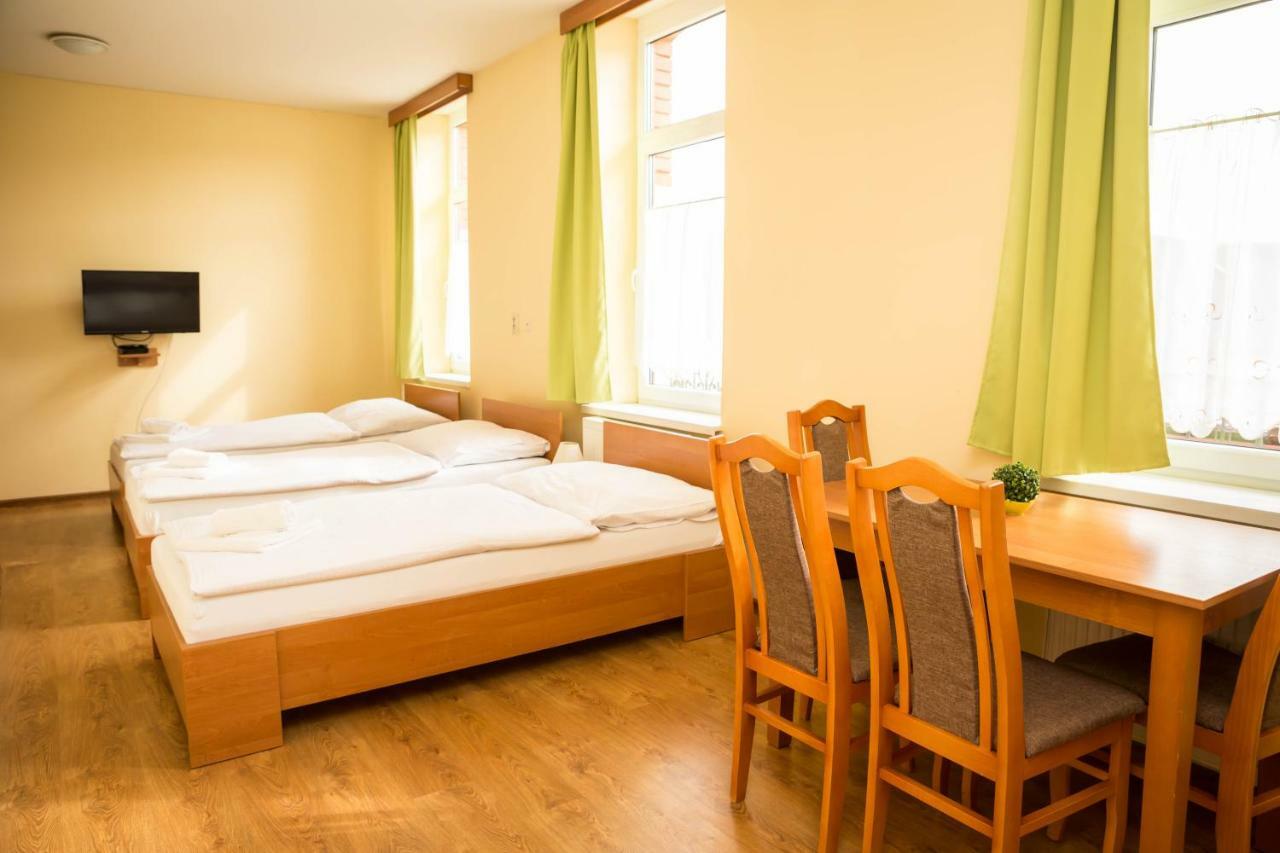 Trojlôžková izba s kuchynským kútom